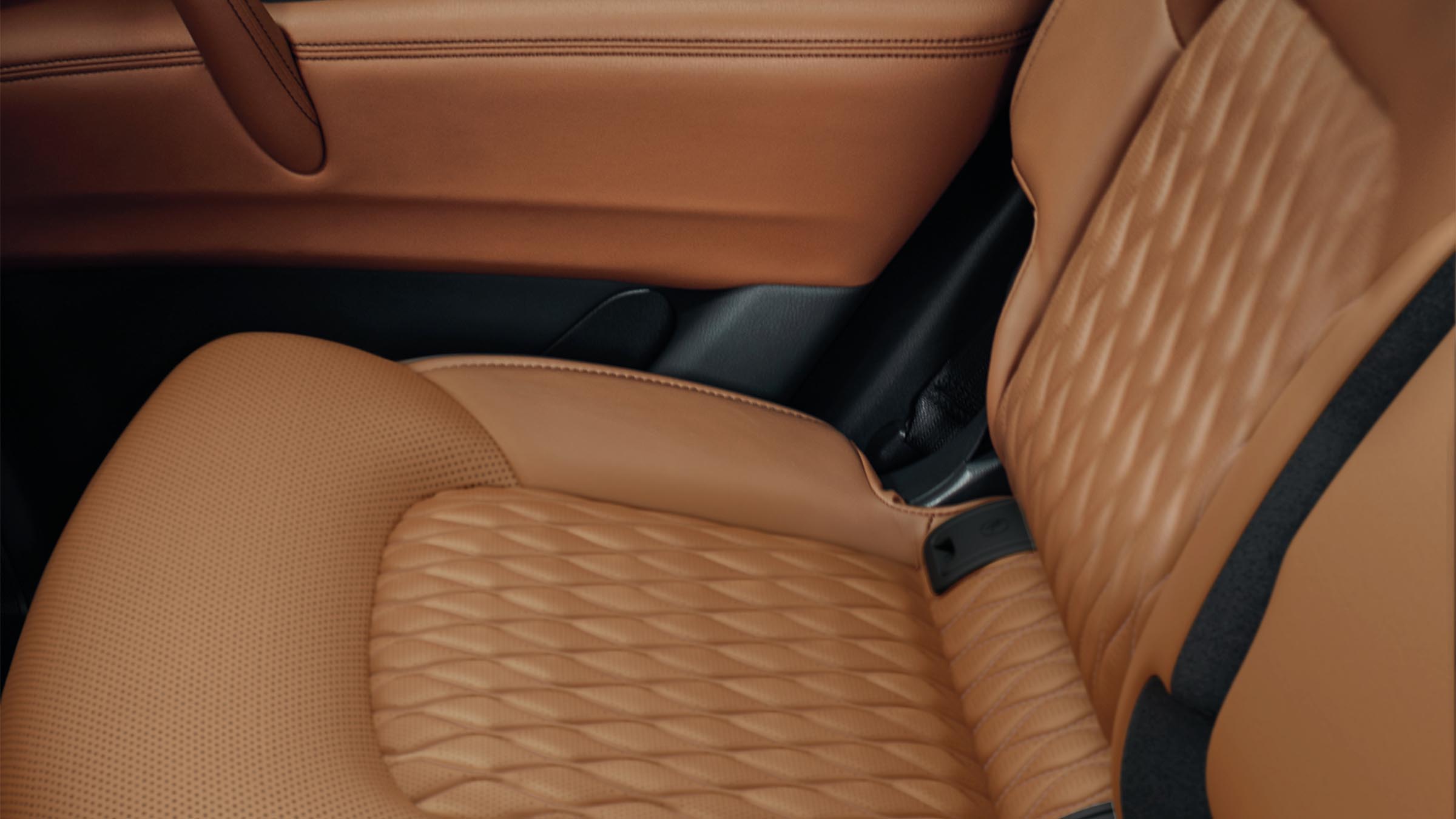 Close-up of 2022 INFINITI QX80 SUV leather seats.